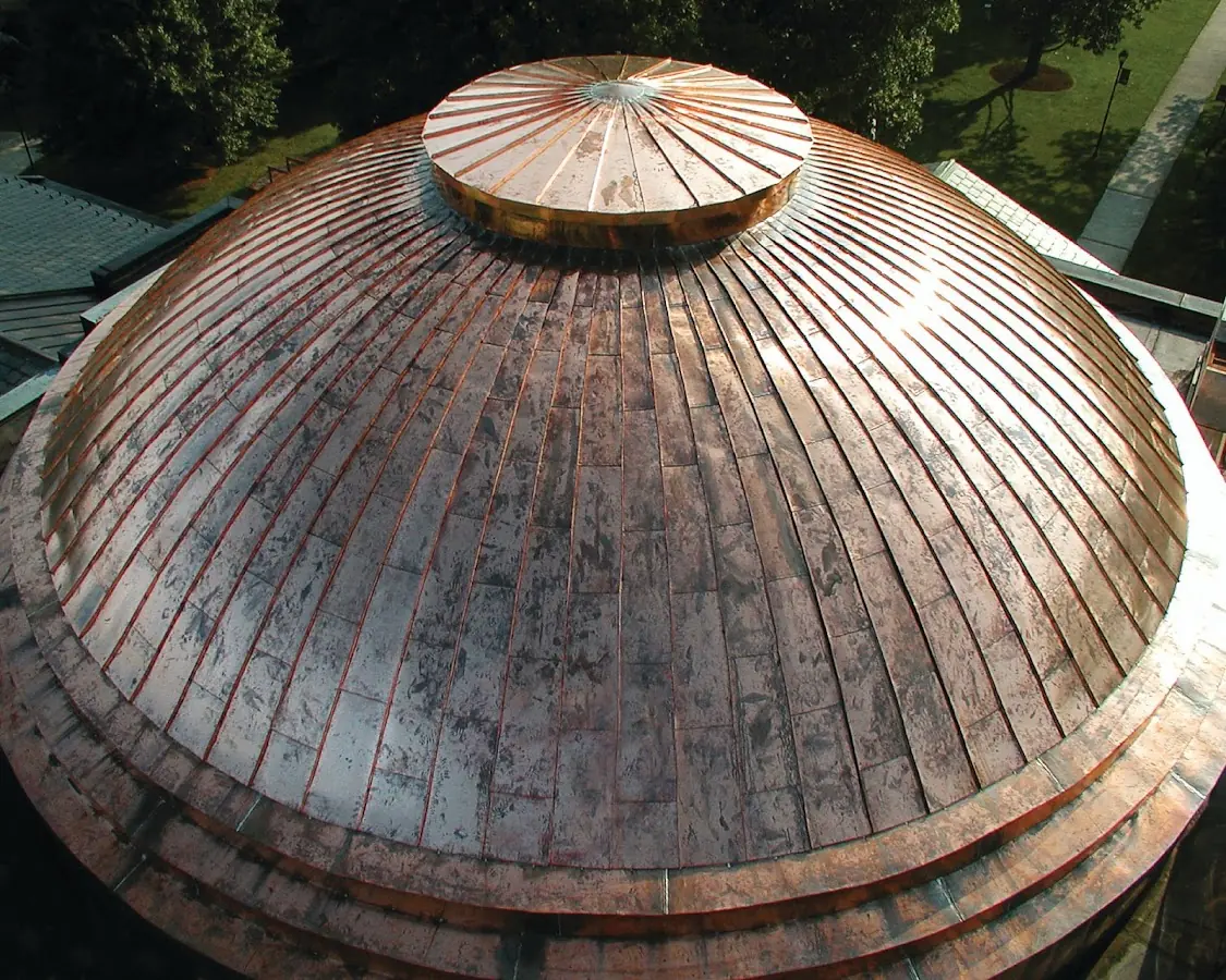 Craftsman Roofing crew installing a new roof in Chestnut Hill